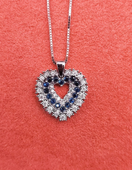 Collana DonnaOro Mistero con Cuore in Oro bianco 18kt con Zaffiri e Diamanti