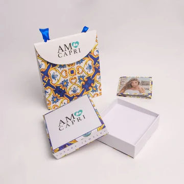 AMOCAPRI Collana in Metallo con campanelle portafortuna smaltata bianca e con cristalli bianchi