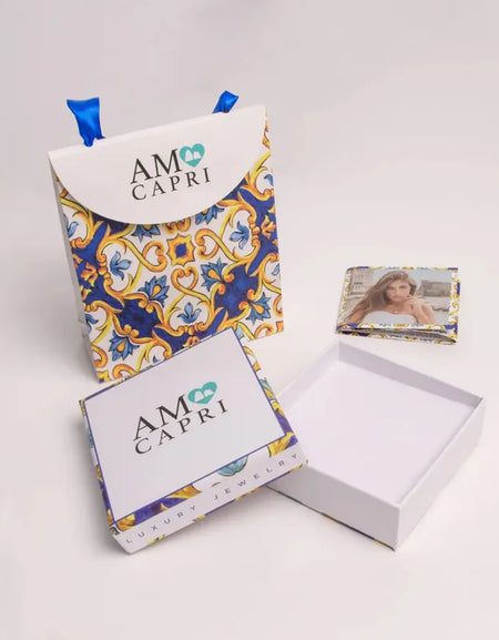 Anello in Acciaio con campanella rosa con scritta Capri AMOCAPRI