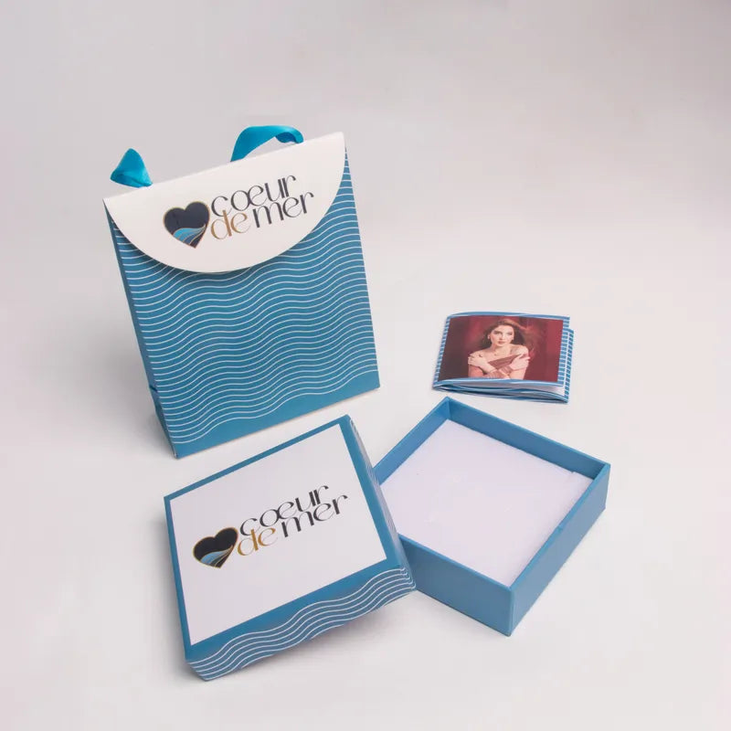 COEUR DE MER Orecchini in Acciaio cerchio intrecciato