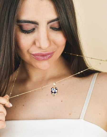 BOCCADAMO MYA Collana Lunga Campanella Dorata con Stelle Bianco Perla e Zirconi Bianchi