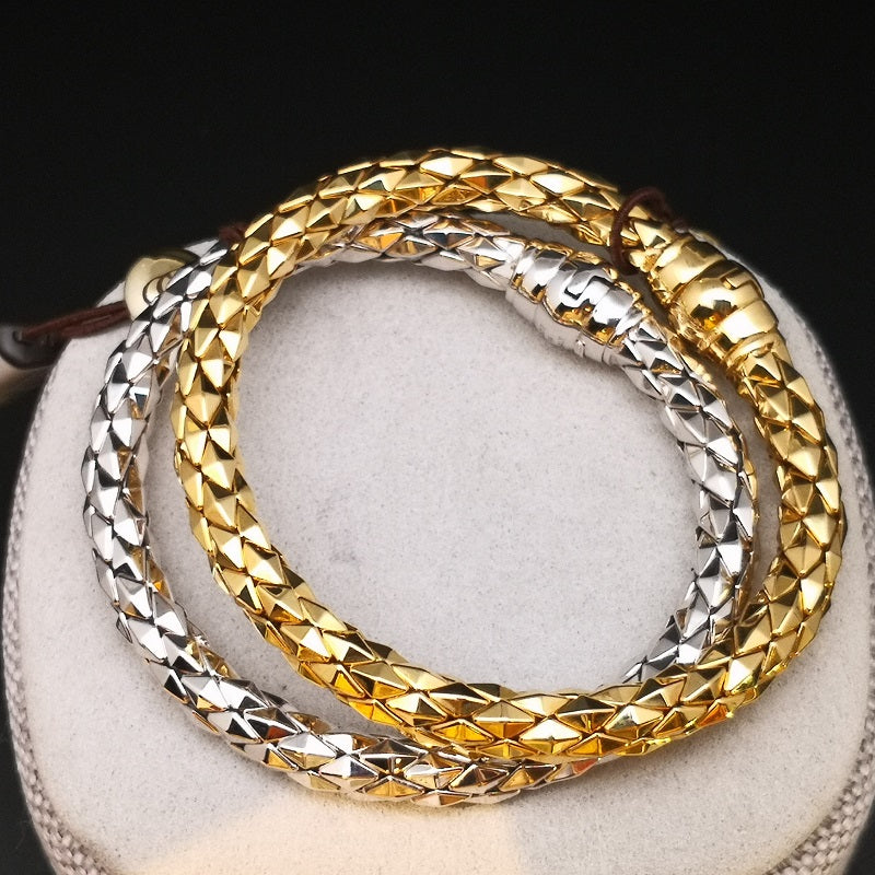 Braccialetto rollò diamantata in oro giallo e bianco 18kt Braccialetto rollò diamantata in oro giallo e bianco 18kt