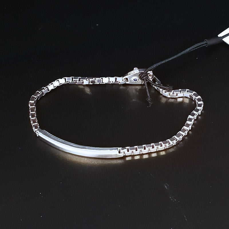 Bracciale CHIMENTO in Argento 925 con piastra squadrata con logo inciso sul lato e zaffiro Blu