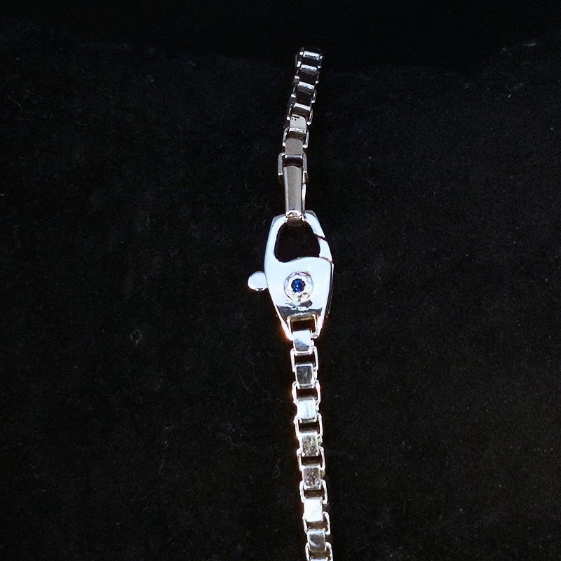 Bracciale CHIMENTO in Argento 925 con piastra squadrata con logo inciso sul lato e zaffiro Blu