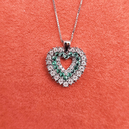 Collana DonnaOro Mistero con Cuore in Oro bianco 18kt con Smeraldi e Diamanti