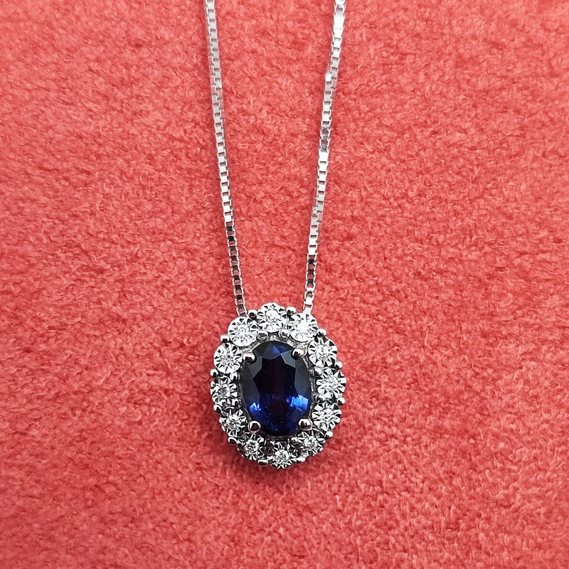 Collana DonnaOro MAGIA con cestino in Oro Bianco 18kt, Diamanti e Zaffiro