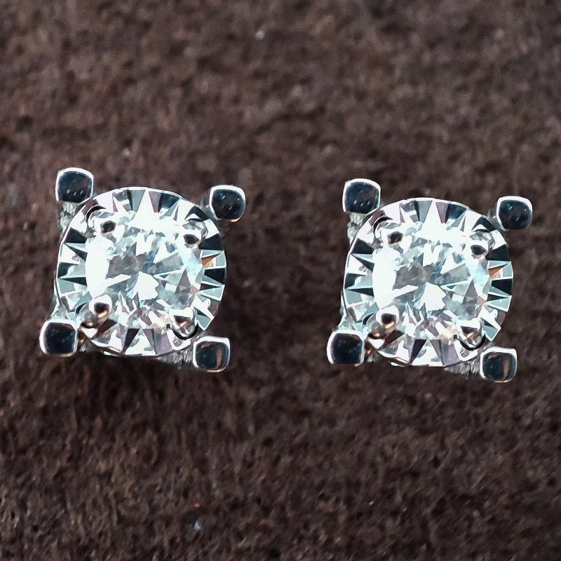 Orecchini DonnaOro ETERNA Punti luce in Oro Bianco 18kt e Diamanti 0.14ct
