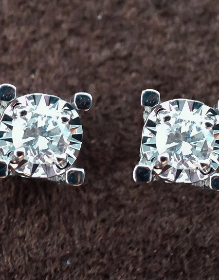 Orecchini DonnaOro ETERNA Punti luce in Oro Bianco 18kt e Diamanti 0.14ct