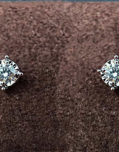 Orecchini DonnaOro ETERNA Punti luce in Oro Bianco 18kt e Diamanti 0.20ct