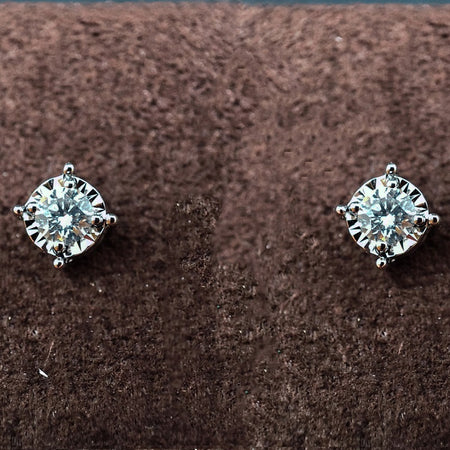 Orecchini DonnaOro ETERNA Punti luce in Oro Bianco 18kt e Diamanti 0.20ct