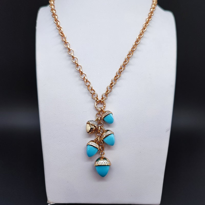 Collana donna BOCCADAMO CALEIDA con ciuffo di cristalli piramidali color turchese e zirconi