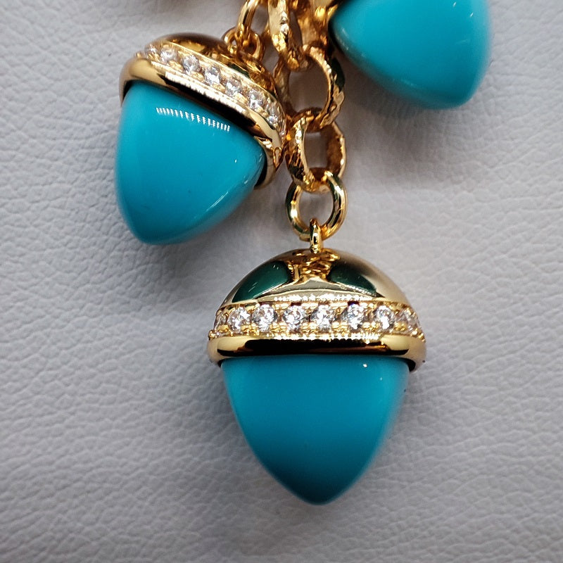 Collana donna BOCCADAMO CALEIDA con ciuffo di cristalli piramidali color turchese e zirconi
