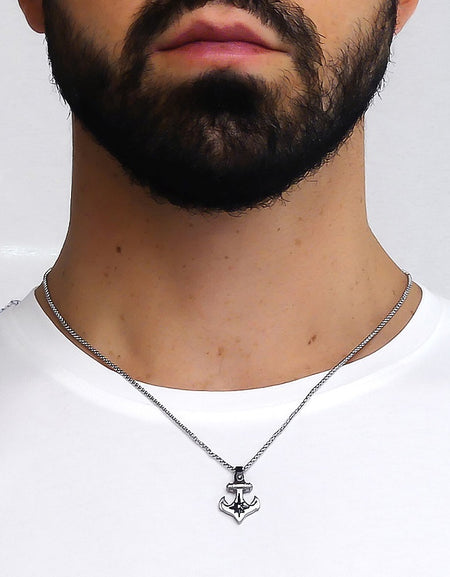 Collana Uomo BOCCADAMO MAN in acciaio e PVD con ancora decorata e zircone centrale